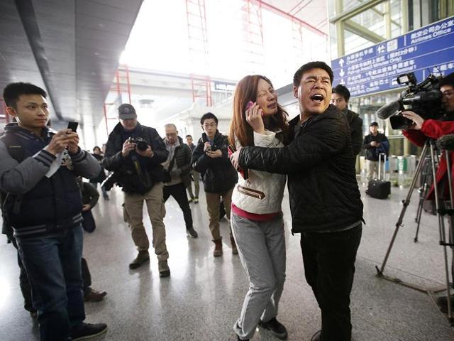 A relative of a passenger onboard crashed Malaysia Airlines jet, cries at the Beijing Capital International Airport in Beijing. (Reuters)
