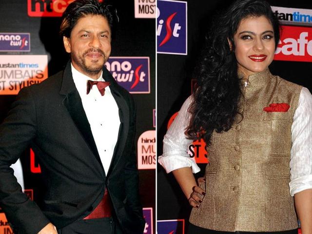 Bollywood actors Shah Rukh Khan (left), and Kajol, both winners of Mumbai's Most Stylish Awards, pose at the ceremony in Mumbai. (AFP) 