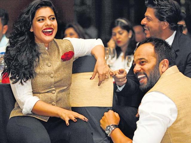 SRK and Kajol were seen chilling out late in the evening. With filmmaker Rohit Shetty here. 