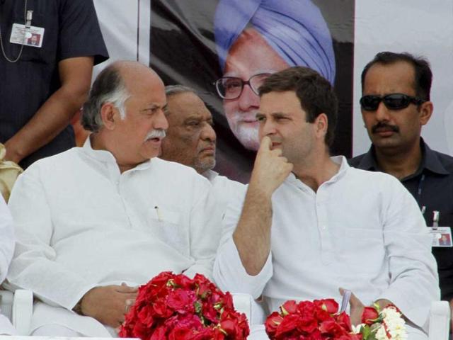 Congress Vice President Rahul Gandhi with party General secretary Gurudas Kamat during an election campaign rally at Balasinor town in Mahisagar district on Tuesday. PTI Photo