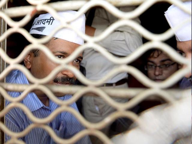Aam Admi Party chief Arvind Kejriwal travels to Churchgate station on a local train in Mumbai for campaigning ahead of Lok Sabha polls. (AFP Photo)