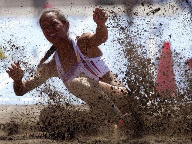 Venezuelan Juliana Angulo Jama competes in Women's Long Jump final during the seventh day of the South American Games at Estadio Nacional, Santiago. (AFP Photo)