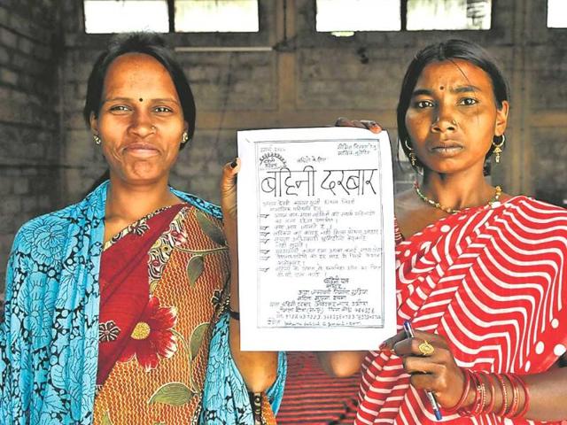 Members-of-the-Bahini-Darbar-group-show-a-copy-of-their-newsletter-Bahini-Darbar-HT-Photo Members-of-the-Bahini-Darbar-group-show-a-copy-of-their-newsletter-Bahini-Darbar-HT-Photo