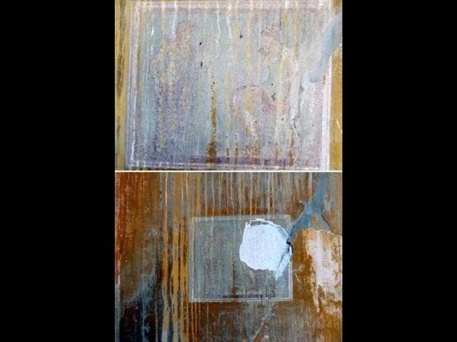 A-handout-combination-of-photo-released-by-the-Italian-culture-minister-press-office-on-March-18-shows-an-ancient-fresco-from-Pompeii-top-and-the-same-fresco-after-thieves-removed-the-portrait-of-a-Greek-deity-from-it-as-they-broke-into-a-closed-area-of-the-UNESCO-World-Heritage-landmark-in-Pompeii-AFP-photo A-handout-combination-of-photo-released-by-the-Italian-culture-minister-press-office-on-March-18-shows-an-ancient-fresco-from-Pompeii-top-and-the-same-fresco-after-thieves-removed-the-portrait-of-a-Greek-deity-from-it-as-they-broke-into-a-closed-area-of-the-UNESCO-World-Heritage-landmark-in-Pompeii-AFP-photo