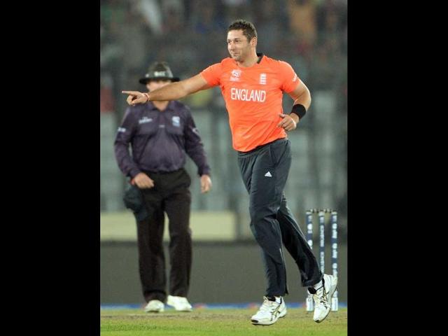 England bowler Tim Bresnan celebrates after taking the wicket of Shikhar Dhawan during the ICC World Twenty20 tournament's warm up match between England and India at The Sher-e-Bangla National Cricket Stadium in Dhaka. (AFP photo)