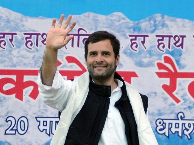 Congress vice-president Rahul Gandhi greets supporters at a rally in Dharamsala. (HT photo/Shyam Sharma)