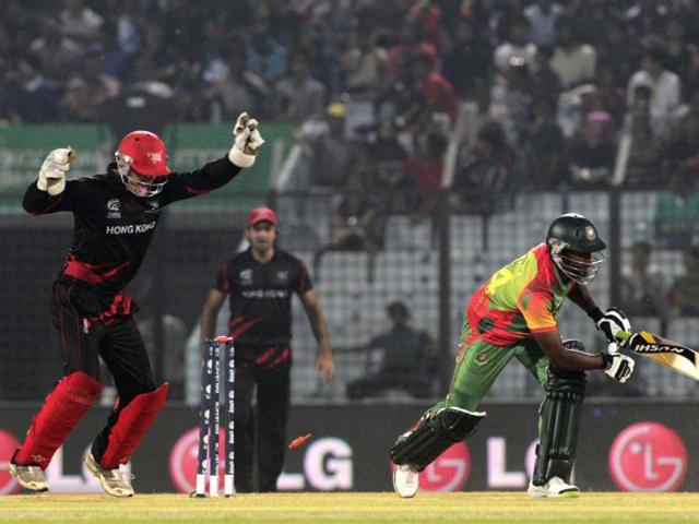 Bangladesh's Rubel Hossain (R) is bowled out during their World T20 match against Hong Kong in Chittagong. (AP Photo)