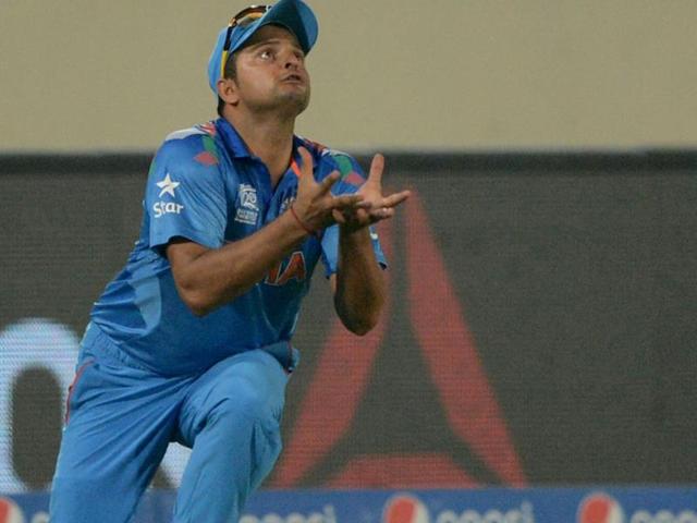 Suresh Raina takes a catch to dismiss Pakistan's Shahid Afridi during their ICC World Twenty20 match at the Sher-e-Bangla National Cricket Stadium in Dhaka. (AFP Photo)