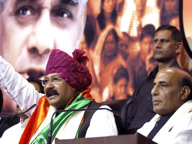 Former congress leader and spiritual guru Satpal Maharaj joins BJP in the presence of BJP National President, Rajnath Singh at party headquarters, in New Delhi. (Photo by Ajay Aggarwal/ Hindustan Times)