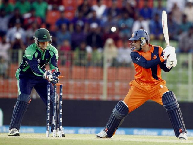 Ireland's wicketkeeper Gary Wilson (L) dislodges the bails to try to dismiss Netherlands' Peter Borren during their ICC World Twenty20 match between in Sylhet. (AP Photo)