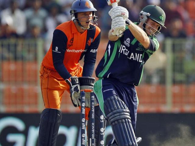Ireland's Ed Joyce (R) plays a shot as Netherlands' Wesley Barresi looks on during their ICC World Twenty20 match in Sylhet. (AP Photo)