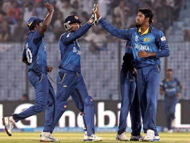 Sri Lanka's Sachithra Senanayake (R) celebrates with teammates the dismissal of South Africa's Hashim Amla during their ICC World Twenty20 match in Chittagong. (AP Photo) Sri Lanka's Sachithra Senanayake (R) celebrates with teammates the dismissal of South Africa's Hashim Amla during their ICC World Twenty20 match in Chittagong. (AP Photo)