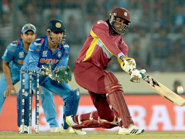 West Indies' Chris Gayle (R) plays a shot during the ICC World Twenty20 match against India at the Sher-e-Bangla National Cricket Stadium in Dhaka. (AFP Photo)