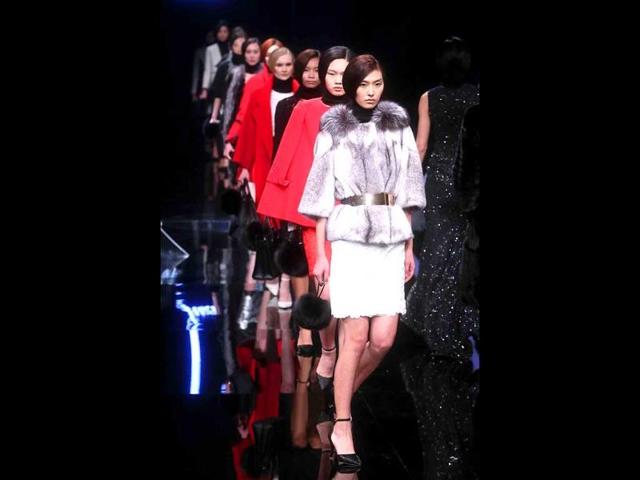 Models in a creation for the Juzui Liu Ming Collection during the China Fashion Week in Beijing. The biannual fashion week is being held from March 25 to 31. (AFP)