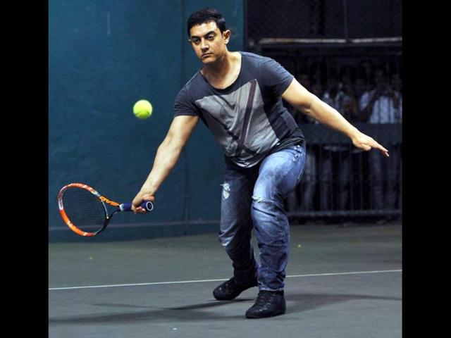 Aamir, who is known for his passion for badminton and tennis, also displayed his skills at the event. (AFP)