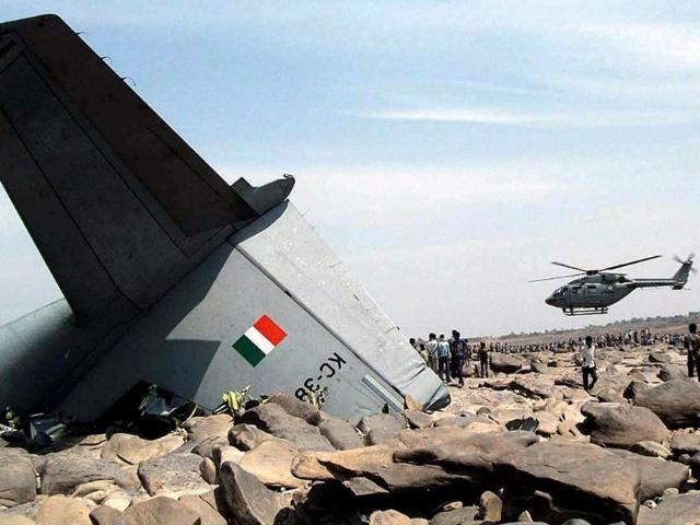 An Indian air force (IAF) helicopter hovers over the site where an IAF cargo plane crashed near Karauli village in the central Indian state of Madhya Pradesh (AP Photo) An Indian air force (IAF) helicopter hovers over the site where an IAF cargo plane crashed near Karauli village in the central Indian state of Madhya Pradesh (AP Photo)