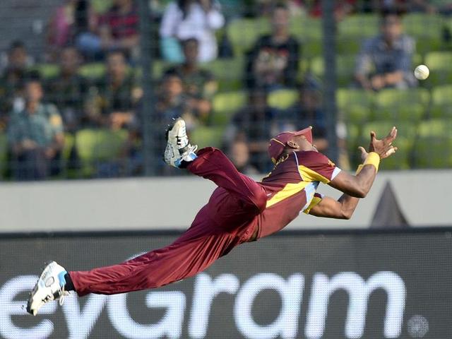 West Indies cricketer Dwayne Bravo takes a catch to dismiss Australia cricketer James Faulkner during the ICC World Twenty20 (AFP photo) West Indies cricketer Dwayne Bravo takes a catch to dismiss Australia cricketer James Faulkner during the ICC World Twenty20 (AFP photo)