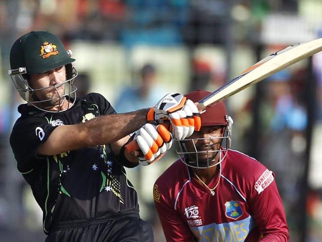 Australia's Glenn Maxwell plays a shot as West Indies' Denesh Ramdin (R) looks on during their ICC Twenty20 World Cup match at the Sher-E-Bangla National Cricket Stadium in Dhaka. (Reuters Photo)