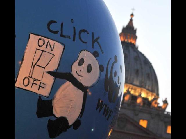 A balloon of the World Wildlife Fund (WWF) is set up in front of St Peter's basilica during the Earth Hour campaign at the Vatican. (AFP photo)