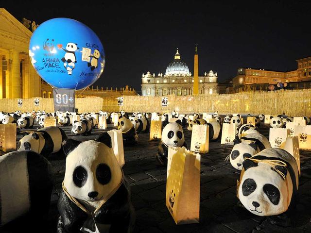 Activists of World Wide Fund (WWF) have set up pandas near St Peter's square as part of the Earth Hour campaign at the Vatican. (AFP photo)