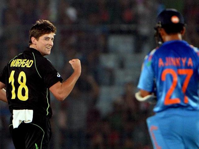 Australia's James Muirhead celebrates the wicket of Virat Kohli during their ICC World Twenty20 match at the Sher-e-Bangla National Cricket Stadium in Dhaka. (AFP Photo)