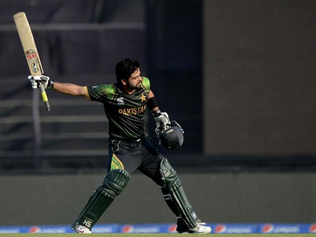 Pakistan's Ahmed Shehzad reacts after scoring a century during their ICC World Twenty20 match against Bangladesh at the Sher-e-Bangla National Cricket Stadium in Dhaka. (AFP Photo)