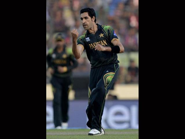 Pakistan's Umar Gul reacts after the dismissal of Bangladesh's Tamim Iqbal during their ICC World Twenty20 match at the Sher-e-Bangla National Cricket Stadium in Dhaka. (AFP Photo)
