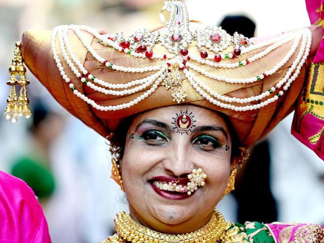 Maharashtrians dressed in traditional costumes attend celebrations to mark the Gudi Padwa festival in Mumbai. (Reuters photo)