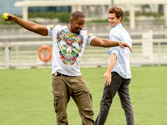 Time to bowl: Jamie Foxx shares a light moment with Andrew Garfield as he tries to get his bowling action right.