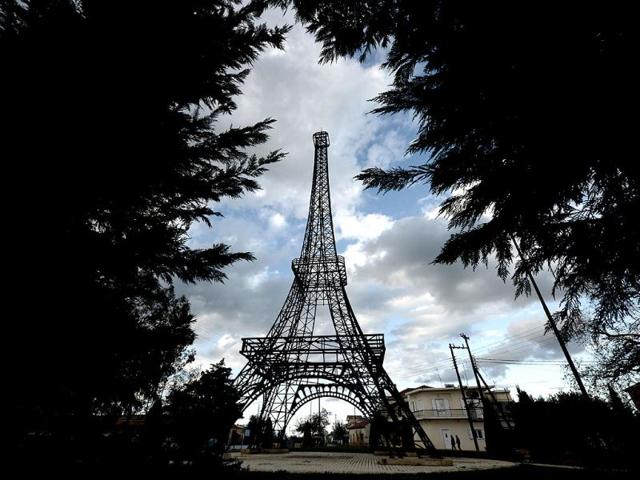 Greece: A 26-meter-high replica of the Eiffel Tower made by Greek doctor and sculptor Harris Fournarakis stands at a square of the entrance of Filiatra village, some 280 kilometers south west of of Athens. (AFP)