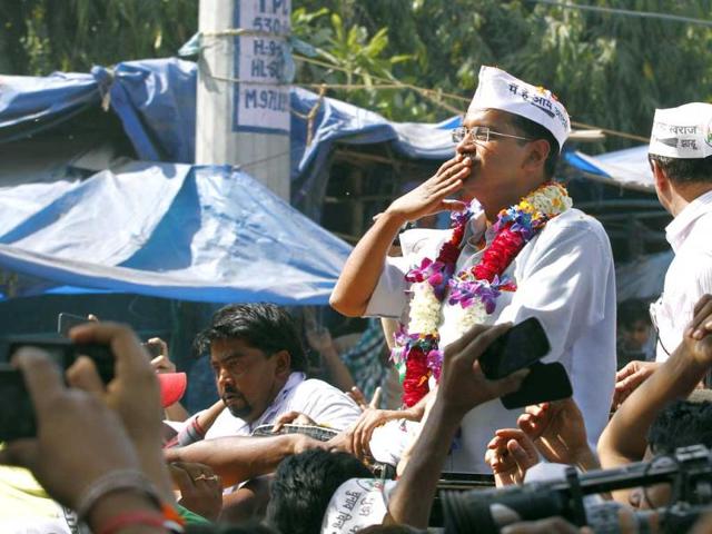 AAP leader Arvind Kejriwal during a road show at Samrat Cinema near Britannia Chowk in the New Delhi. (Arun Sharma/HT Photo) 