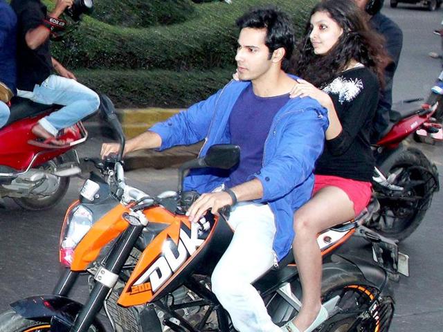 Lucky shot: Varun Dhawan is seen with the winner of a contest held during Main Tera Hero promotions.