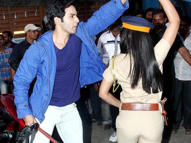Varun seems to have a way with women. Here, he takes the officer for a spin.