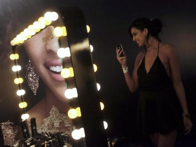 The final moments selfie - A model caught catching herself on camera just before she takes on the ramp at Sao Paulo Fashion Week. (Reuters Photo)