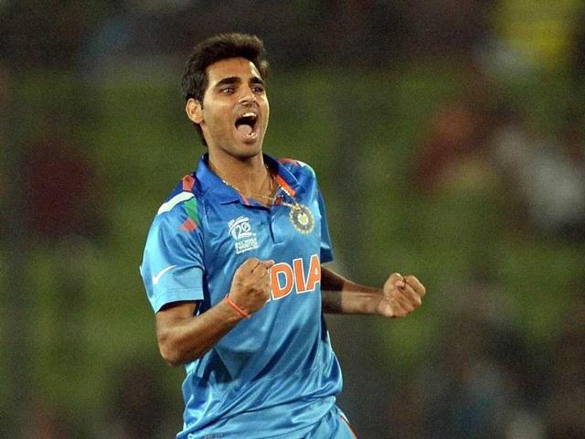 Bhuvneshwar Kumar celebrates the wicket of South Africa's Quinton de Kock during their ICC World Twenty20 match in the Sher-e-Bangla National Cricket Stadium in Dhaka. (AFP Photo)
