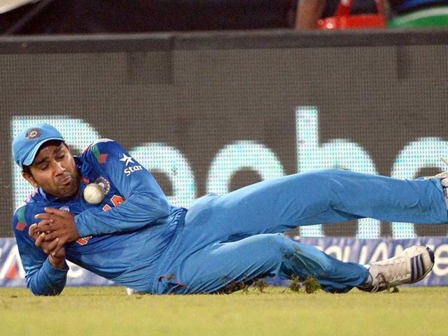 Rohit Sharma misfields at the boundary during their ICC World Twenty20 match against South Africa at the Sher-e-Bangla National Cricket Stadium in Dhaka. (AFP Photo)