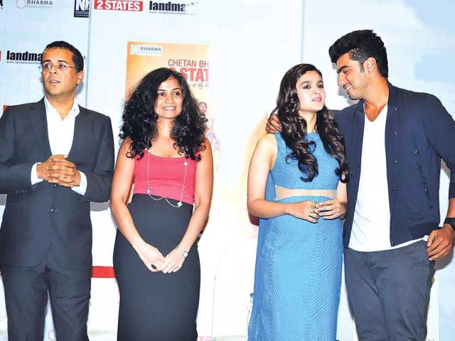 Is Arjun Kapoor trying to make eye contact with Alia Bhatt? Or is he just pointing out what we all have just noticed — all that concealer! (Photo: Prodip Guha)