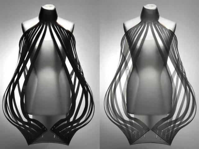 Intimacy is a high-tech fashion project exploring the relation between intimacy and technology. Its high-tech garments entitled 'Intimacy White' and 'Intimacy Black' are made out of opaque smart e-foils that become increasingly transparent based on close and personal encounters with people. (Photo: Studio Roosegaarde)