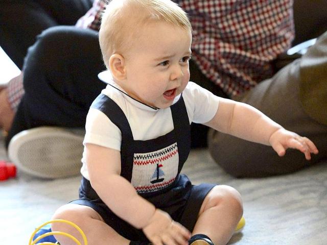 Prince George plays at a Plunket play group event at in Wellington, New Zealand. (Reuters photo)