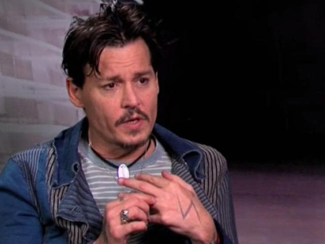 Who-can-beat-Hollywood-hearthrob-Johnny-Depp-s-nerdy-look-Not-many-HT-Photo