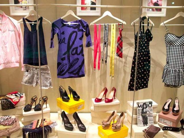 Clothes and accessories worn by late British singer Amy Winehouse are also displayed. (AFP)