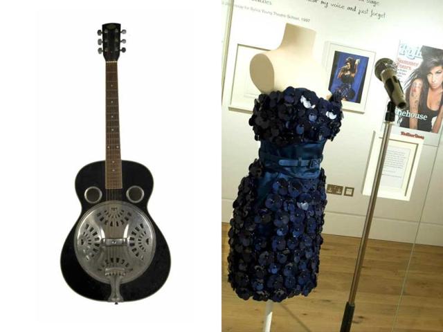 Her most treasured guitar and the Luella Bartley dress worn by Winehouse at Glastonbury 2008. (AFP)