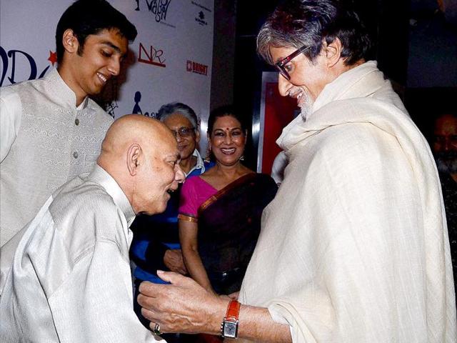 Amitabh Bachchan with Anwar Ali (brother of comedian Mehmood) at special screening of film Bombay to Goa as tribute to 10th death anniversary of actor Mehmood at PVR screens in Juhu on Saturday. (PTI Photo)