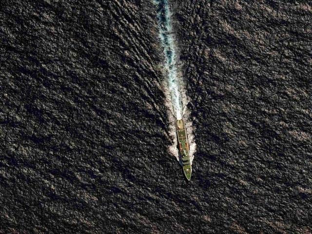 The Chinese Maritime Safety Administration (MSA) vessel Hai Xin 01 is seen from a Royal New Zealand Air Force (RNZAF) P-3K2 Orion aircraft in the southern Indian Ocean, as the search continues for missing Malaysian Airlines flight MH370. (Reuters)