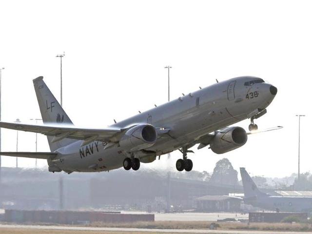 A US Navy P8 Poseidon takes off from Perth Airport en route to rejoin the ongoing search operations for missing Malaysia Airlines Flight MH370 in Perth, Australia. (AP photo)