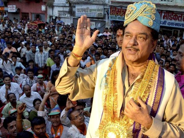 BJP Lok Sabha candidate from Patna Sahib seat Shatrughan Sinha gestures at an election campaign rally in Patna. (PTI Photo)
