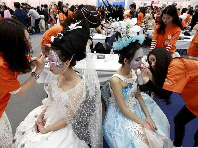 Models get their makeup done during K-Beauty World Fashion Festival in Gwacheon, South Korea. (AP)