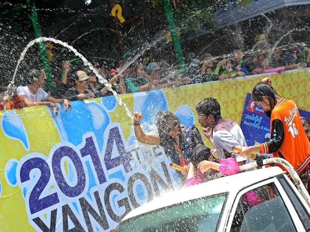 People take part in celebrations for Thingyan, a water festival which marks Myanmar's new year in Yangon. (AFP photo)