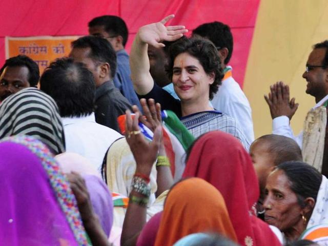 Priyanka Gandhi Vadra waves during her public meeting for giving final touch to Sonia Gandhi poll campaign in Raebareli. (HT photo/Deepak Gupta)