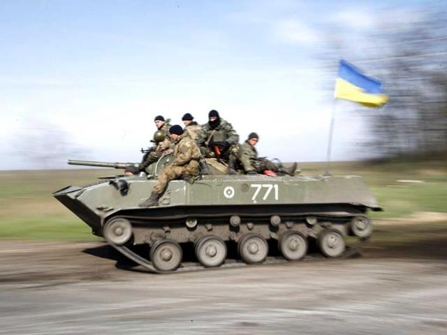 Ukrainian soldiers drive an airborne combat vehicle near Kramatorsk, in eastern Ukraine. (Reuters)